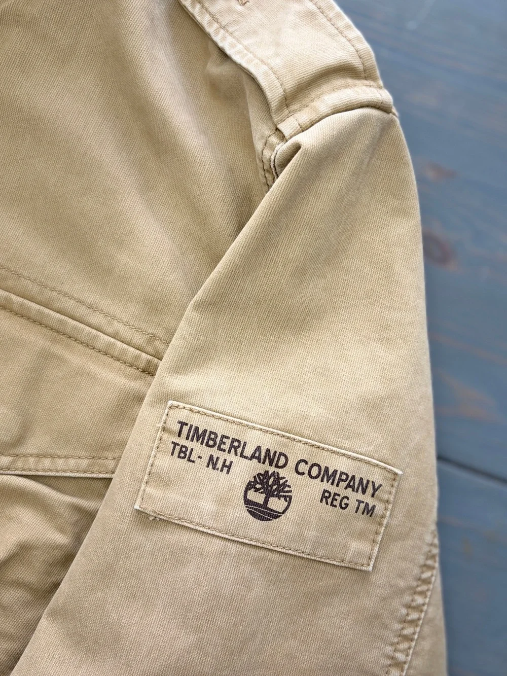 Timberland men’s military/field-style jacket in tan/khaki, size Small.